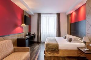 Postel nebo postele na pokoji v ubytování Best Western Plus Monopole Métropole