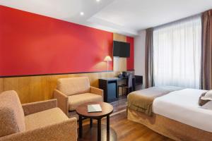 Postel nebo postele na pokoji v ubytování Best Western Plus Monopole Métropole