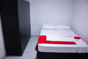 Een bed of bedden in een kamer bij Believe