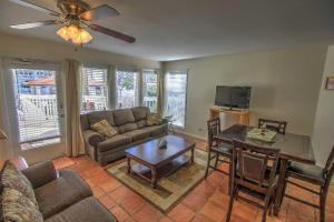 a living room with a couch and a table at Gulfpoint 3103 Condominium Condo in South Padre Island