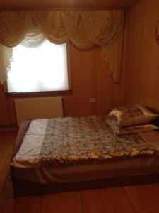 Postel nebo postele na pokoji v ubytování Карпатська перлина