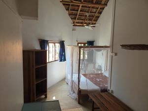 Postel nebo postele na pokoji v ubytování Surfpoint Sri Lanka Kite Village