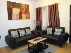 Posezení v ubytování The Oasis Davao Condotel