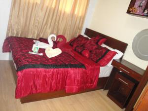 Postel nebo postele na pokoji v ubytování The Oasis Davao Condotel