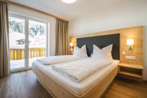 Posteľ alebo postele v izbe v ubytovaní Appartement Botenwirt