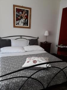 Postel nebo postele na pokoji v ubytování B&B A spasso per Torino