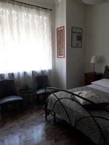 Postel nebo postele na pokoji v ubytování B&B A spasso per Torino
