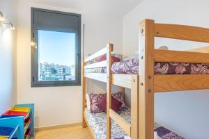 A bed or beds in a room at Apart-rent Apartment Cristall Mar 2º 0058