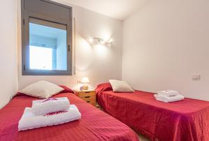 A bed or beds in a room at Apart-rent Apartment Cristall Mar 2º 0058