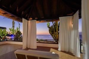a view of the ocean from a resort balcony at Secrets Lanzarote Resort & Spa - Adults Only (+18) in Puerto Calero