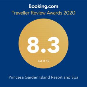 un cercle jaune avec les mots prix de la revue de voyage et spa dans l'établissement Princesa Garden Island Resort and Spa, à Puerto Princesa