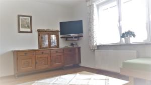 Telewizja i/lub zestaw kina domowego w obiekcie Ferienwohnung Szöky