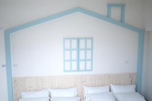 Voodi või voodid majutusasutuse Chiang Mi No.1 B&B toas
