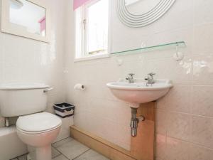 Koupelna v ubytování Bolitho's Retreat + 15 fotografií