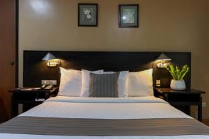 Ένα ή περισσότερα κρεβάτια σε δωμάτιο στο Technopark Hotel