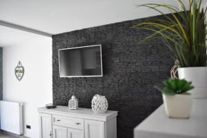 TV a/nebo společenská místnost v ubytování Villa Waterfalls Plitvice