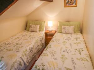 Postel nebo postele na pokoji v ubytování Westfield Cottage