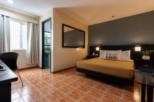 Ένα ή περισσότερα κρεβάτια σε δωμάτιο στο Technopark Hotel