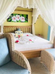 Postel nebo postele na pokoji v ubytování Patatran Village Hotel