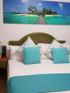 Posteľ alebo postele v izbe v ubytovaní Apartamentos Costa Menorca