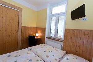 Posteľ alebo postele v izbe v ubytovaní Romance Ubytování