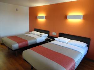 Postel nebo postele na pokoji v ubytování Motel 6-Round Rock, TX