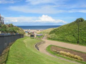 a view of the beach from the top of a hill at Smugglers' Cottage in Marske-by-the-Sea