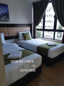Postel nebo postele na pokoji v ubytování Yeob Bay hotel Ampang