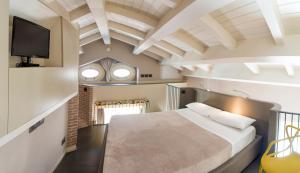 A bed or beds in a room at Casa Turrisi