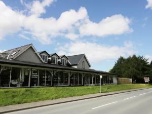 a building on the side of a road at Station Apartment in Llanberis