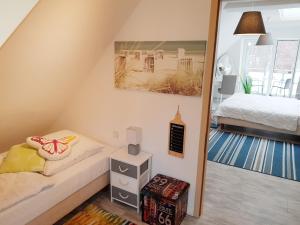 Ein Bett oder Betten in einem Zimmer der Unterkunft Ostseeblick Baabe