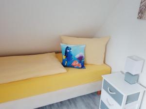 Ein Bett oder Betten in einem Zimmer der Unterkunft Ostseeblick Baabe