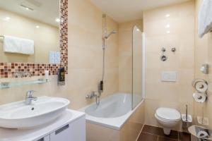 Koupelna v ubytování Hotel Astor
