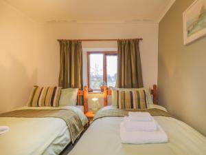 Katil atau katil-katil dalam bilik di Low Garth Cottage