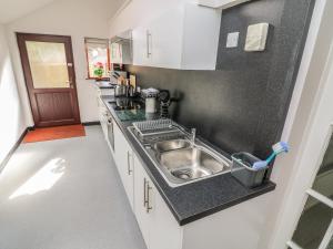 Η κουζίνα ή μικρή κουζίνα στο Long Crag Annexe