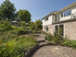 a garden in front of a house at Exe View in Dawlish