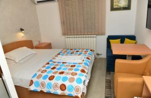 Una cama o camas en una habitación de Hotel Sunce