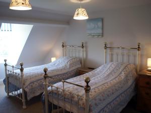Postel nebo postele na pokoji v ubytování Heightley House