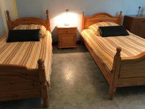 Ein Bett oder Betten in einem Zimmer der Unterkunft Wagner Ferien Apartments