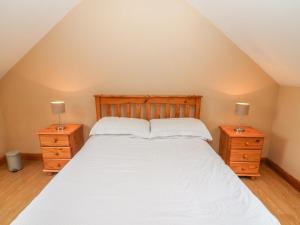 Voodi või voodid majutusasutuse Cahirkeen Cottage toas
