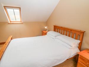 Voodi või voodid majutusasutuse Cahirkeen Cottage toas