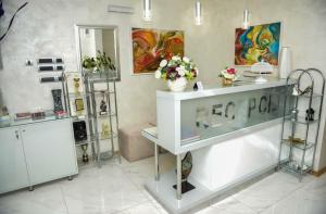 a flower shop with flowers on display in a room at Hotel Sunce in Kraljevo