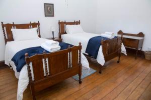 Postel nebo postele na pokoji v ubytování Roode Bloem Farm House