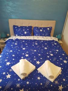 Voodi või voodid majutusasutuse Apartman KEJ BLUE free parking toas