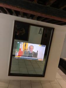 a picture of a picture of a man on a wall at Domus Antiqua San Lorenzo in Genova