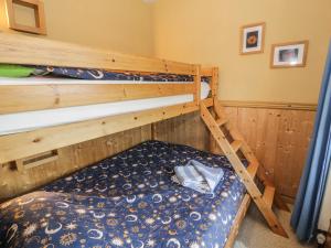 Ліжко або ліжка в номері 2 Waterloo Cottage
