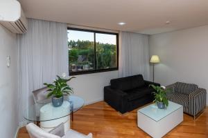 Uma área de estar em Viale Cataratas Hotel & Eventos