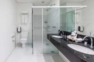 Um banheiro em Viale Cataratas Hotel & Eventos