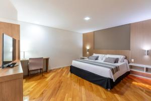 Cama ou camas em um quarto em Viale Cataratas Hotel & Eventos