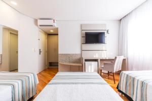 Cama ou camas em um quarto em Viale Cataratas Hotel & Eventos